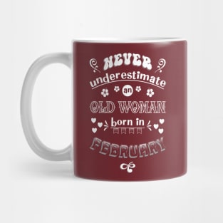 Never Underestimate an Old Woman Born in February Mug